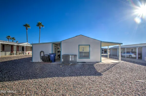 a house view with a backyard space