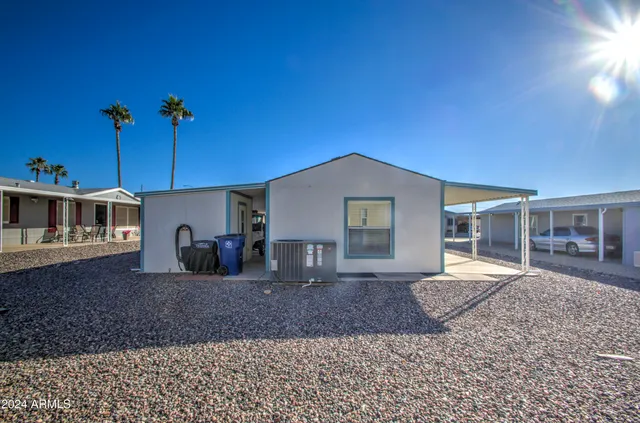 a house view with a backyard space