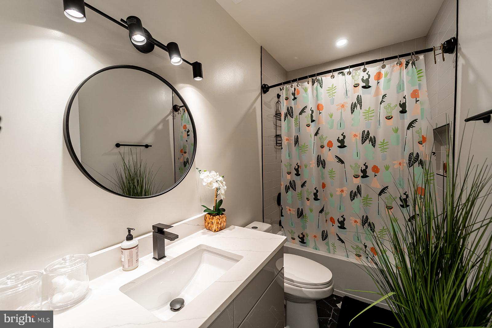 1919 Bennett Place Northeast Washington, DC 20002 - Photo 13 of 18 Chic bathroom with vibrant accents.