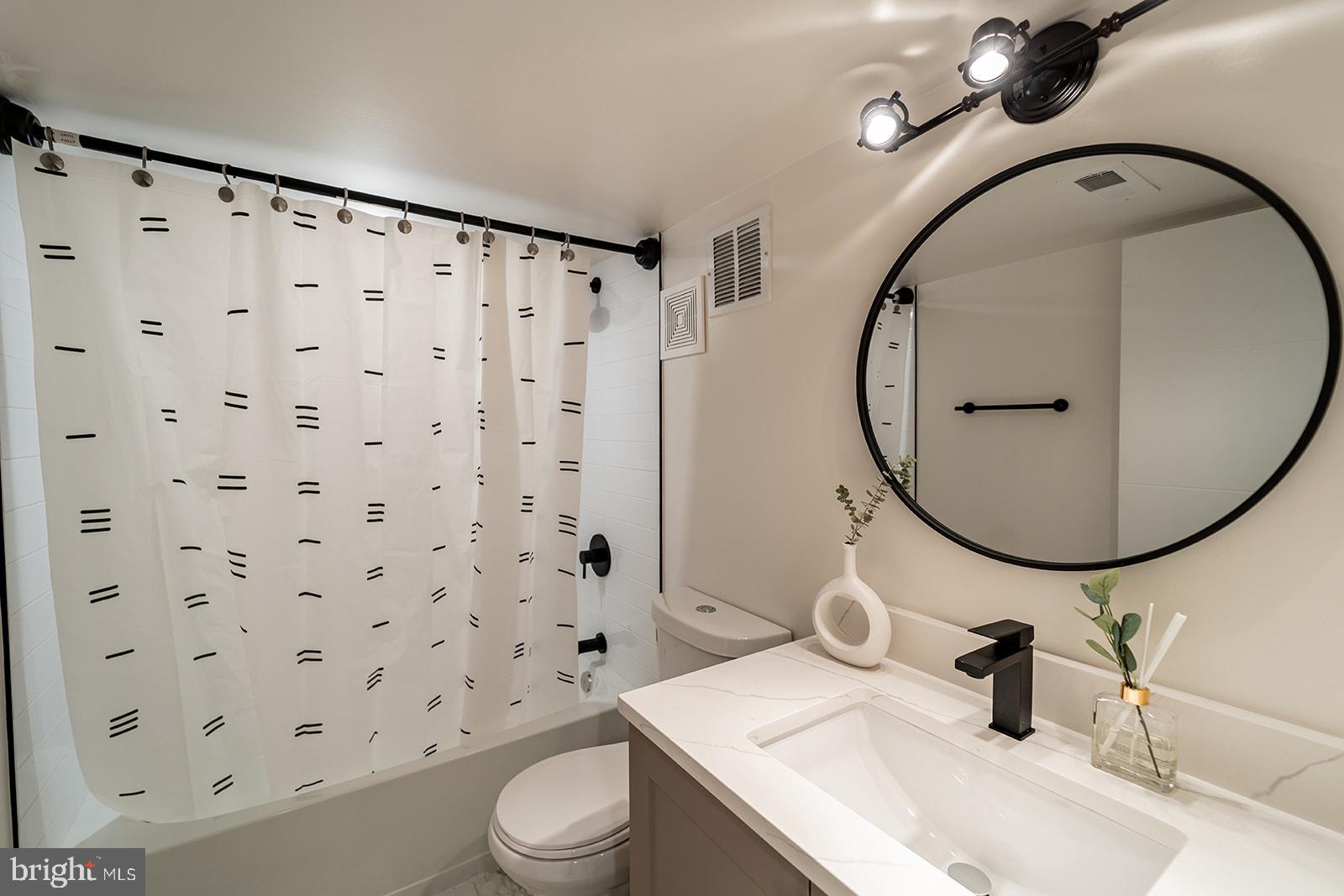 1919 Bennett Place Northeast Washington, DC 20002 - Photo 17 of 18 Modern bathroom with sleek design.