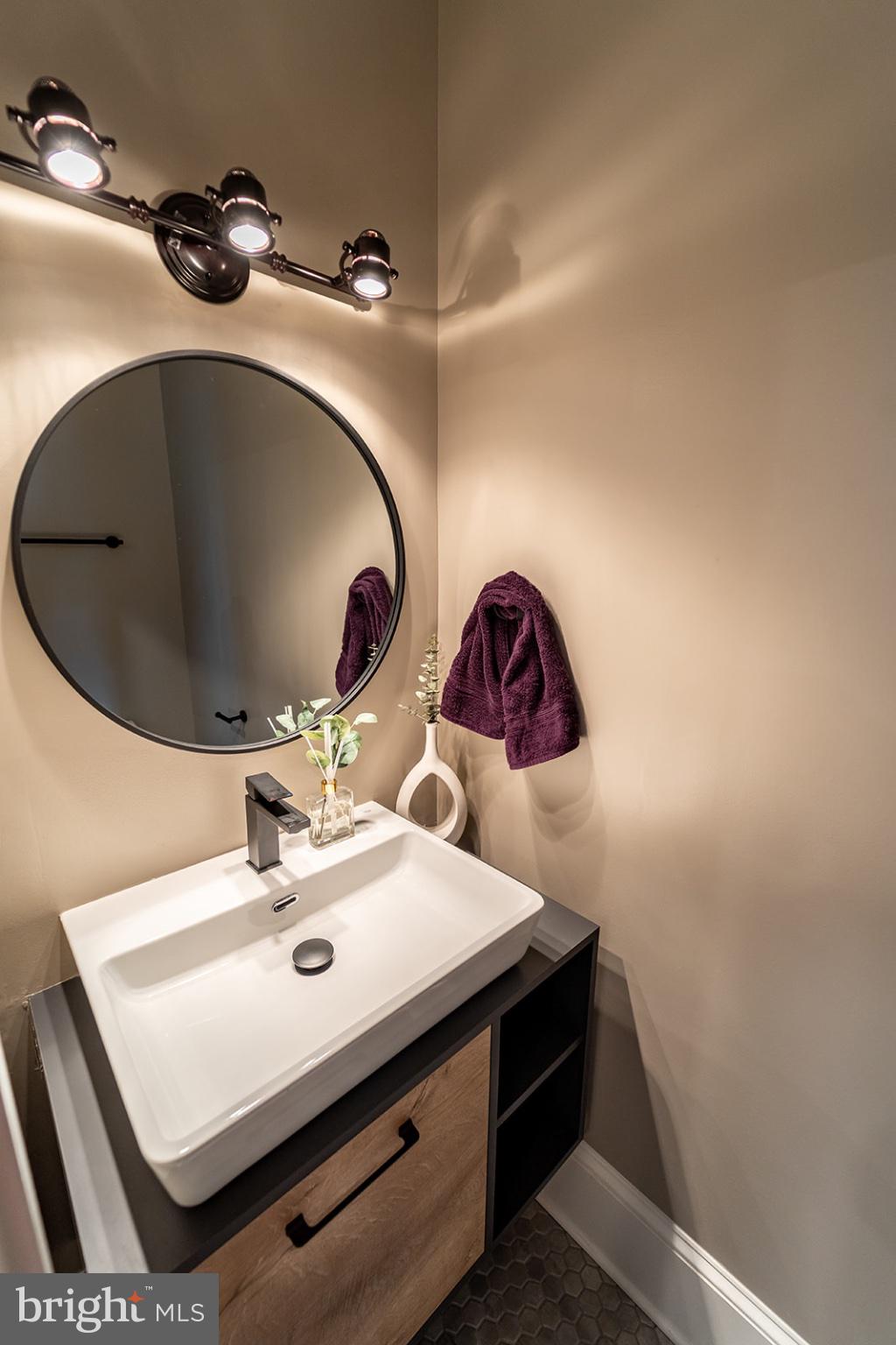 1919 Bennett Place Northeast Washington, DC 20002 - Photo 7 of 18 Sleek modern bathroom with elegant touches.