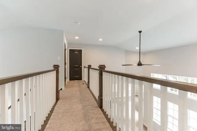 a view of a hallway with a window