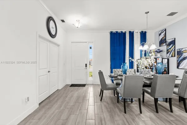 a view of a dining room with furniture