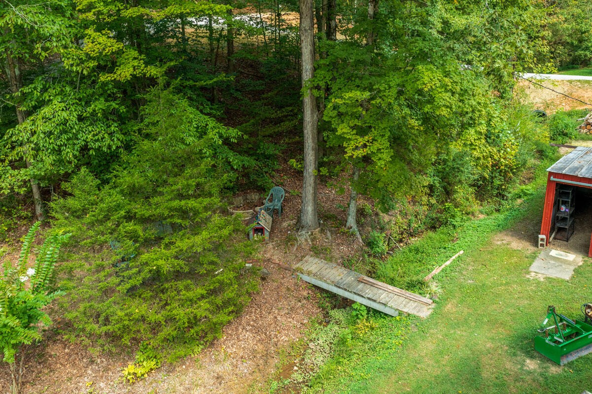 184 Davidson Hollow Road Heiskell, TN 37754 - Photo 38 of 40 a backyard of a house with lots of green space