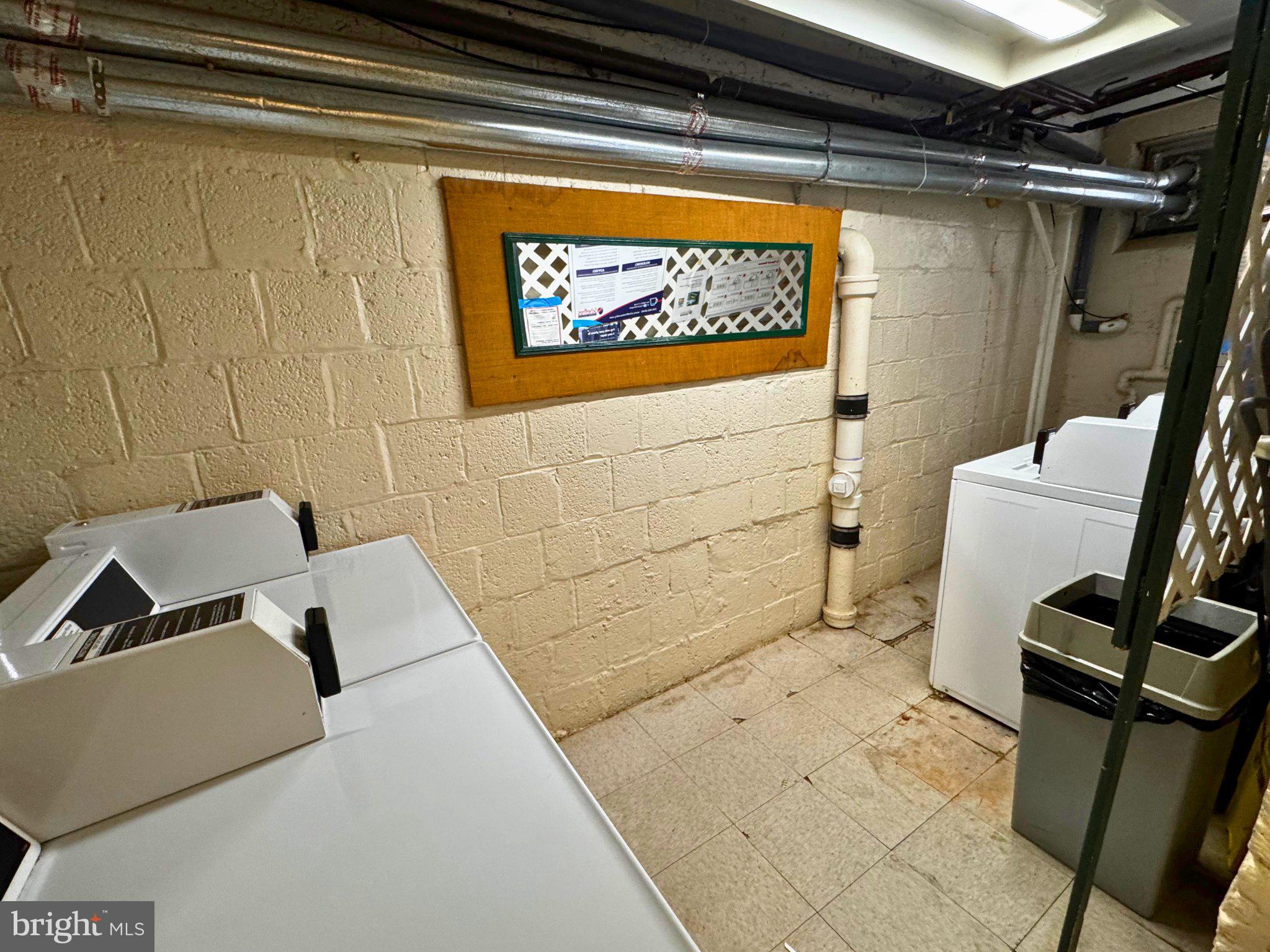 24 South Old Glebe Road, Unit 101 Arlington, VA 22204 - Photo 16 of 19 Bright and functional laundry space.