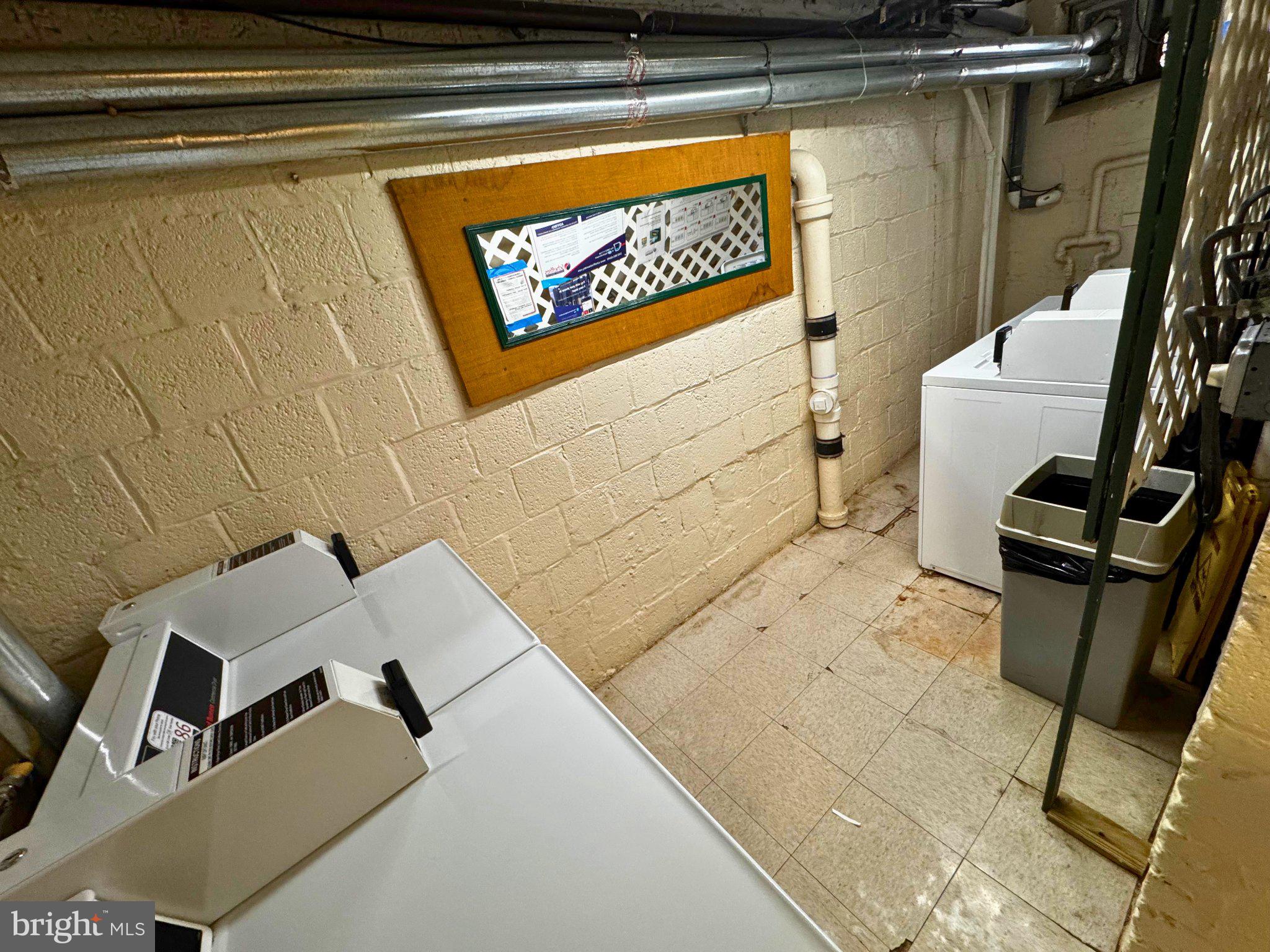 24 South Old Glebe Road, Unit 101 Arlington, VA 22204 - Photo 17 of 19 Functional laundry space with natural light.