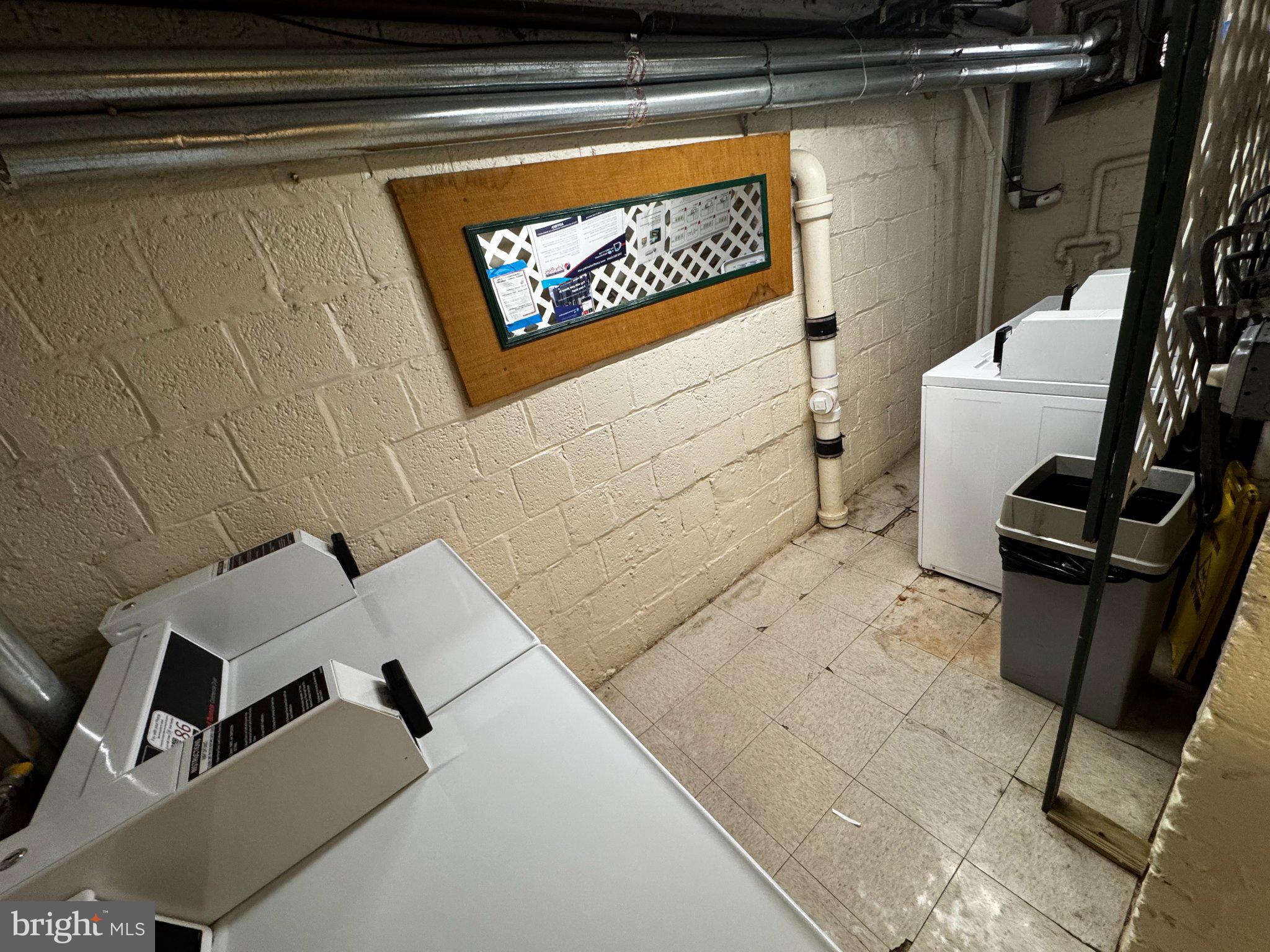 24 South Old Glebe Road, Unit 101 Arlington, VA 22204 - Photo 18 of 19 Functional laundry space with natural light.
