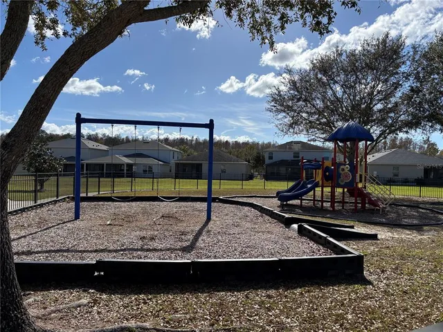 a view of a park with slide