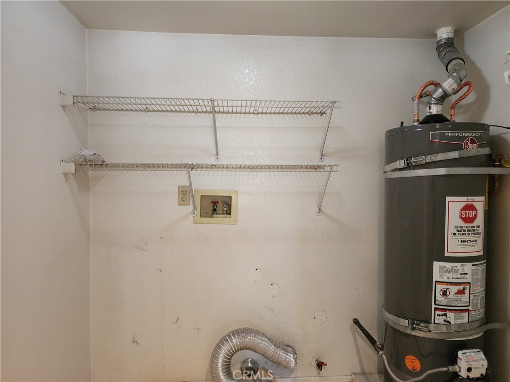 7350 Greenhaven Avenue, Unit 59 Rancho Cucamonga, CA 91730 - Photo 12 of 20 a utility room with dryer and washer