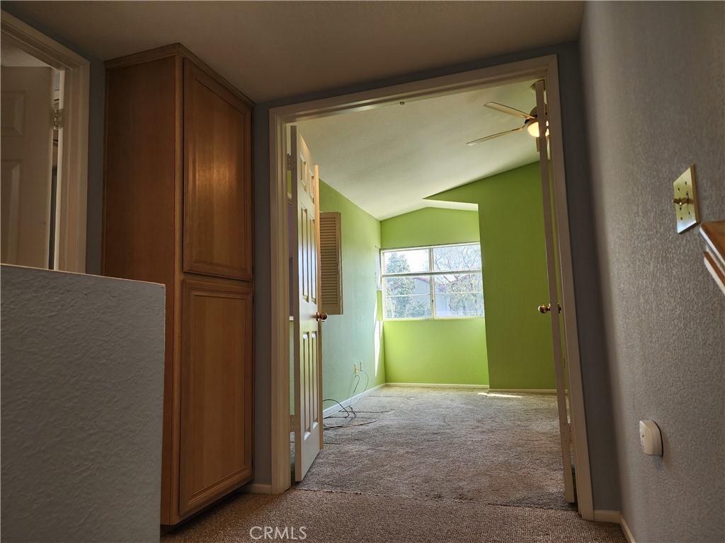 7350 Greenhaven Avenue, Unit 59 Rancho Cucamonga, CA 91730 - Photo 15 of 20 a view of a bathroom with a shower and a mirror