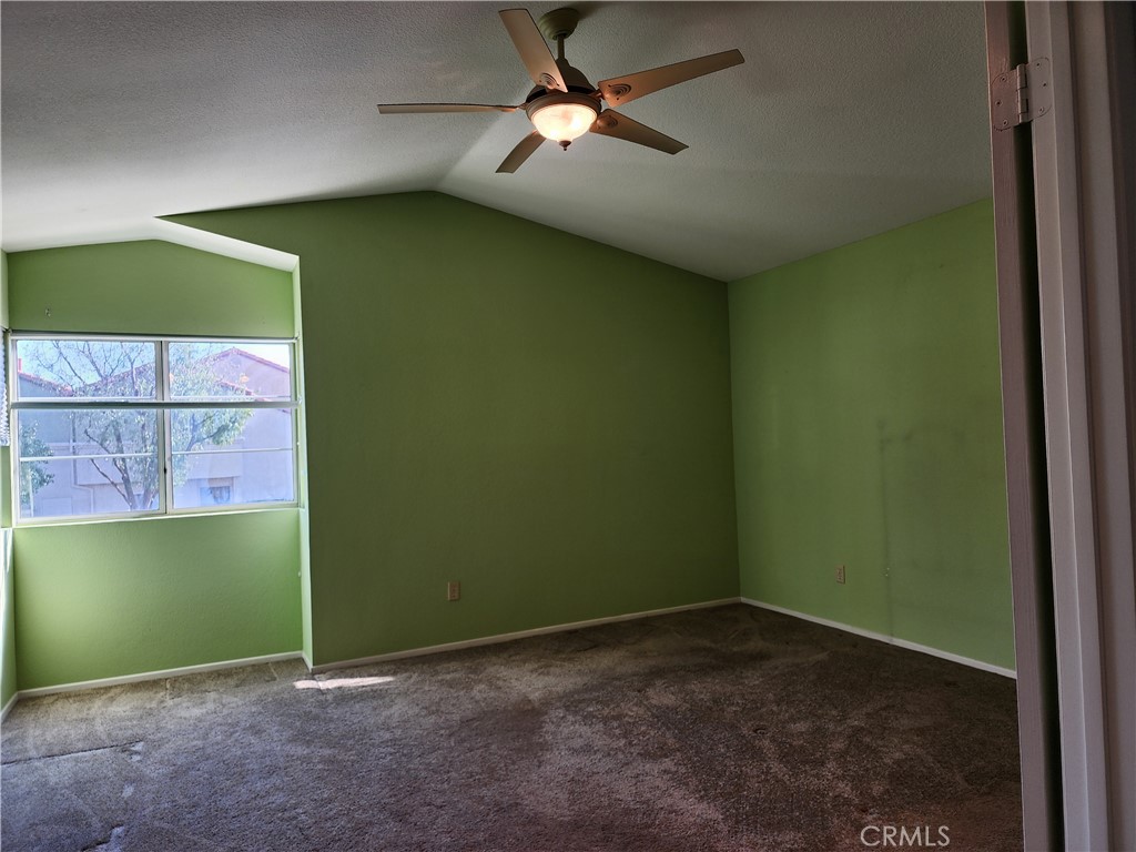 7350 Greenhaven Avenue, Unit 59 Rancho Cucamonga, CA 91730 - Photo 17 of 20 a view of empty room with fan and window