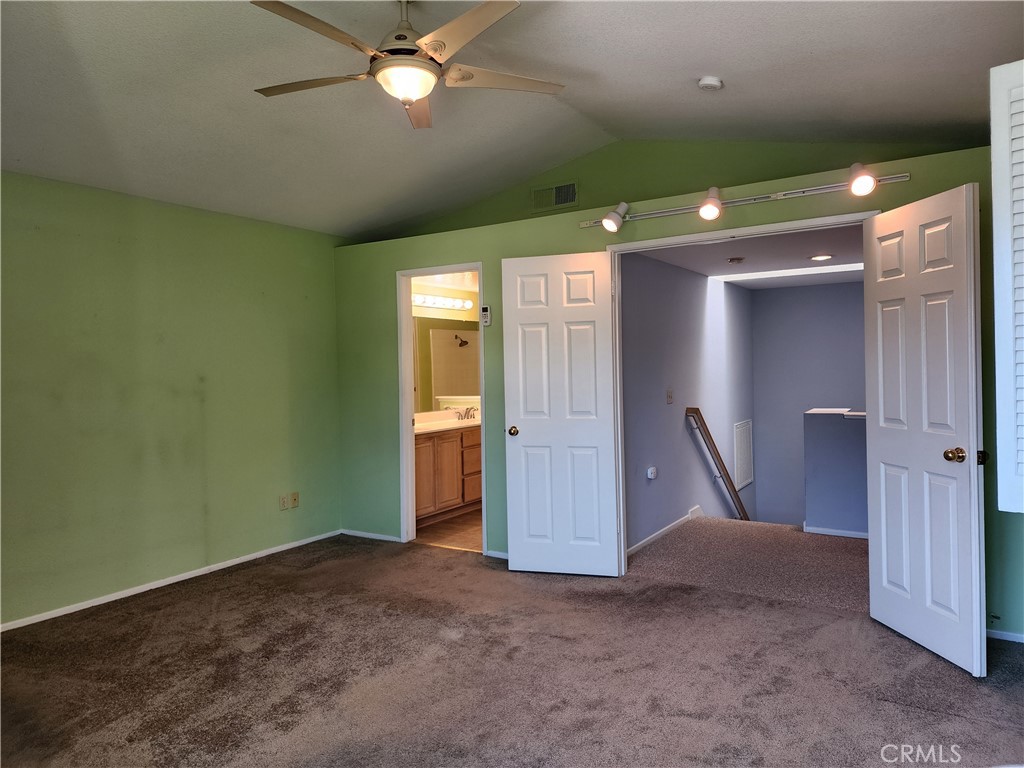 7350 Greenhaven Avenue, Unit 59 Rancho Cucamonga, CA 91730 - Photo 18 of 20 a view of a livingroom with a chandelier