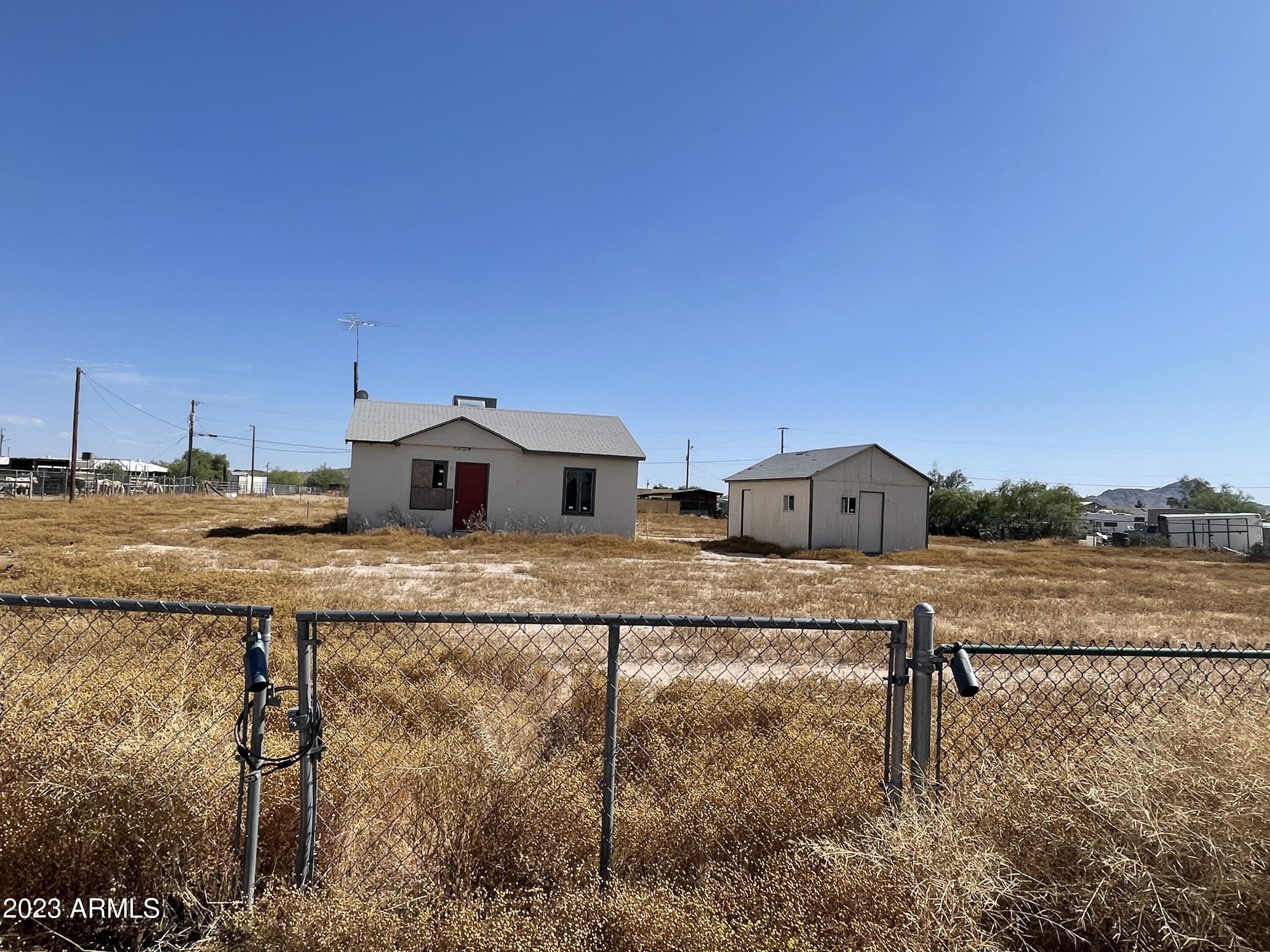 19727 West Rustler Road Buckeye, AZ 85326 - Photo 1 of 15 61FEF3C3-B0BB-493F-BB71-A21A23985EAA