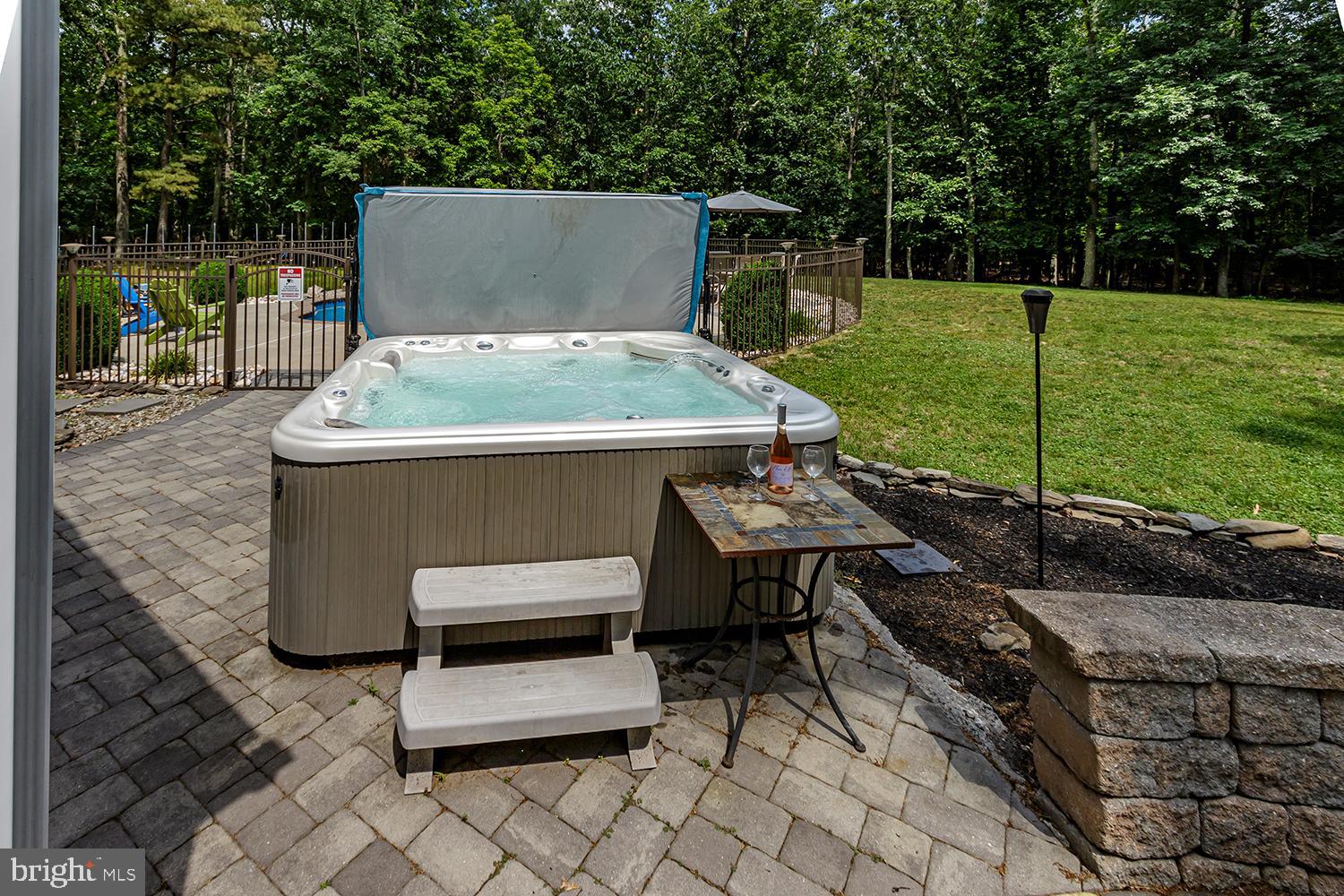 13 Oniontown Road Medford, NJ 08055 - Photo 26 of 37 Hot tub spa next to pool on patio