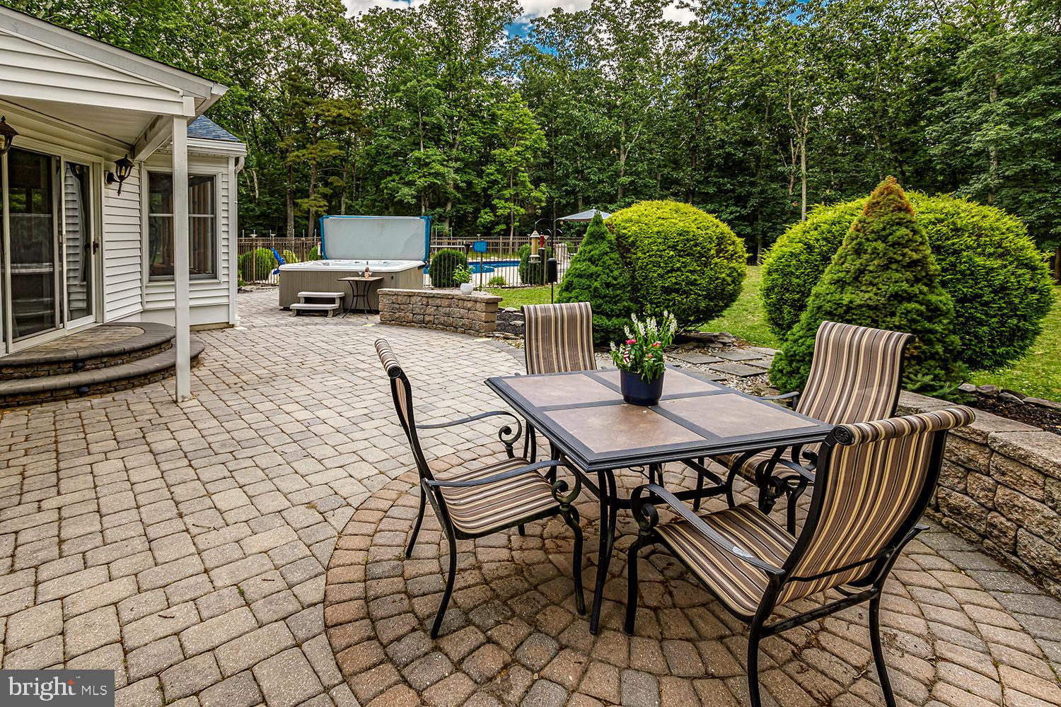 13 Oniontown Road Medford, NJ 08055 - Photo 27 of 37 Paver patio overlooking yard and pool