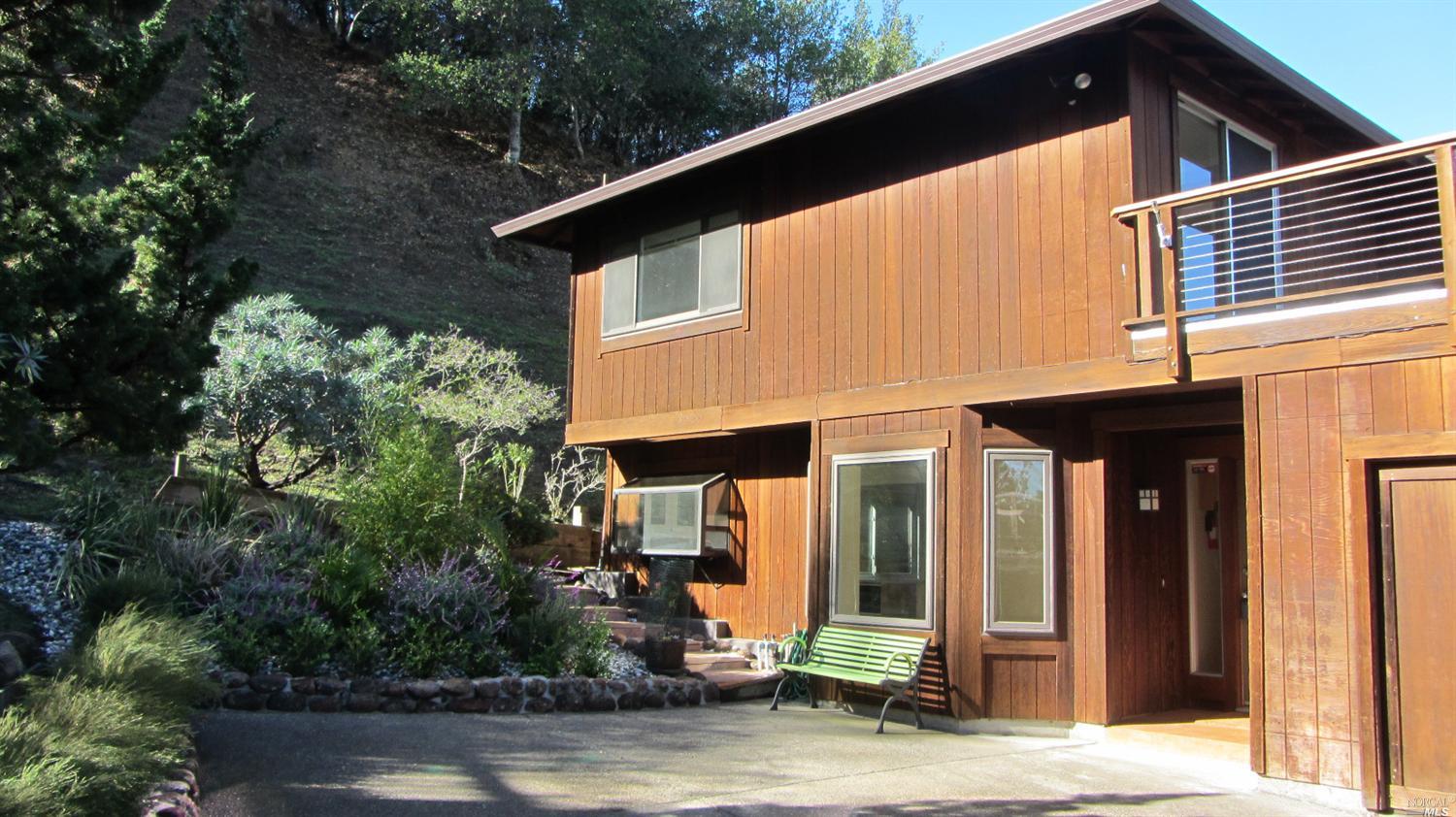 209 Irwin Street San Rafael, CA 94901 - Photo 1 of 1 a front view of a house with garden