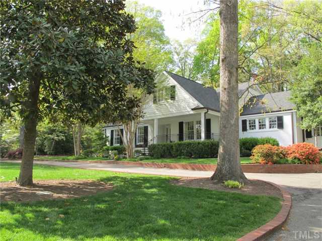 418 Yarmouth Road Raleigh, NC 27608 - Photo 3 of 25 a front view of a house with a yard