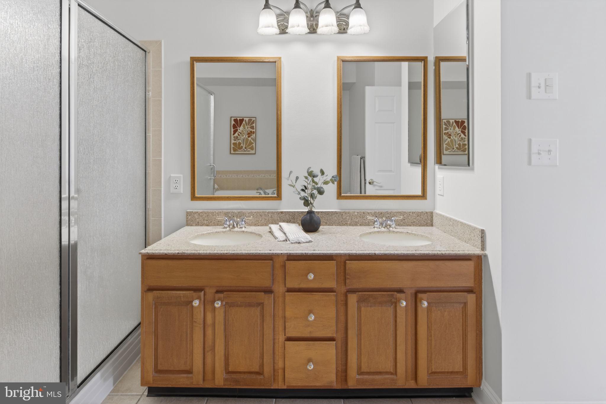 1 Warwick Road Princeton Junction, NJ 08550 - Photo 20 of 45 Elegant dual-sink bathroom retreat.