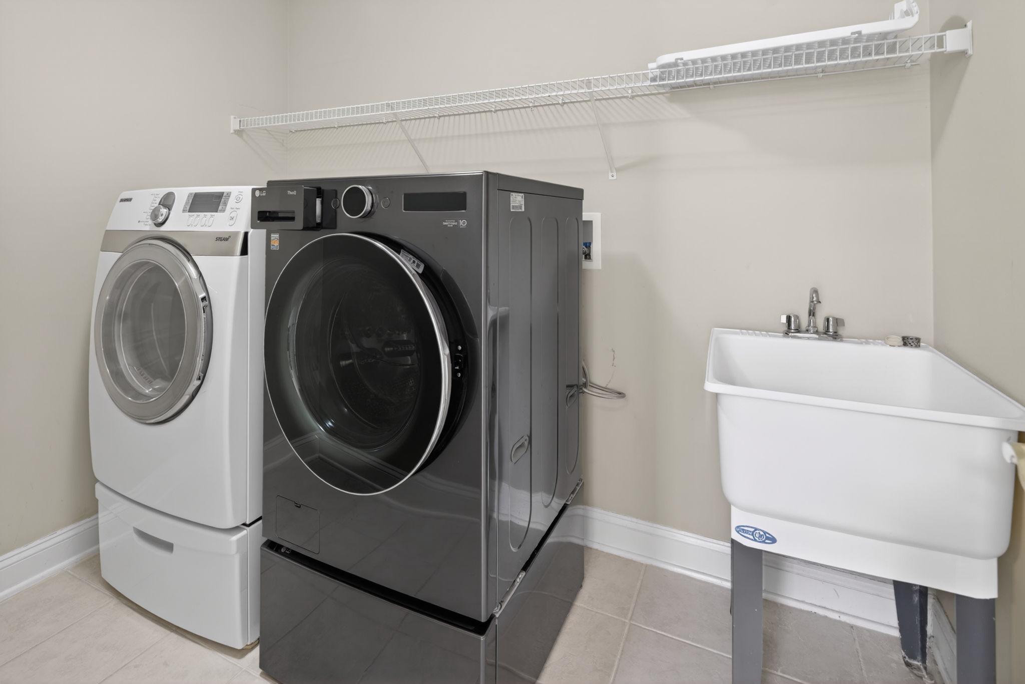 1 Warwick Road Princeton Junction, NJ 08550 - Photo 30 of 45 Modern laundry space with front loading appliances