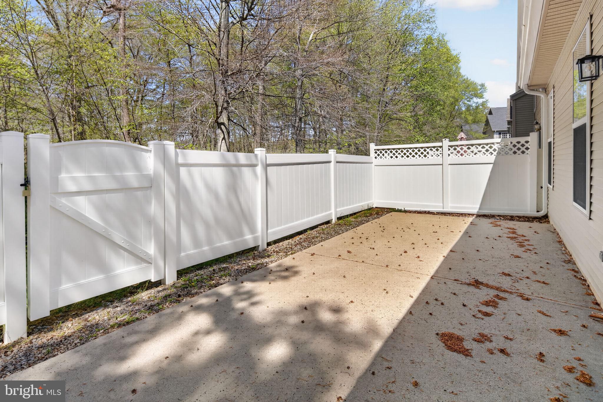 1 Warwick Road Princeton Junction, NJ 08550 - Photo 32 of 45 Serene outdoor space with white fencing.