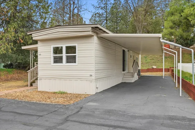 a view of a house with a garage