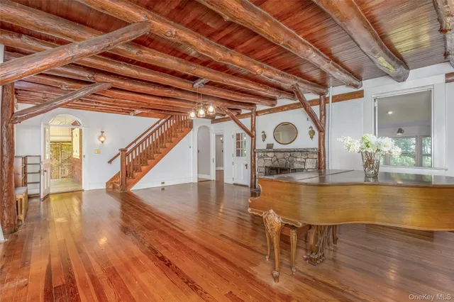 a view of an outdoor space with wooden floor