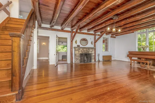 a view of a livingroom with wooden floor