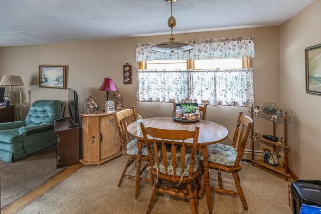 a view of a street with house and trees