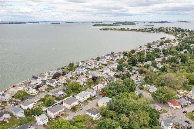 a bedroom with furniture and wooden floor