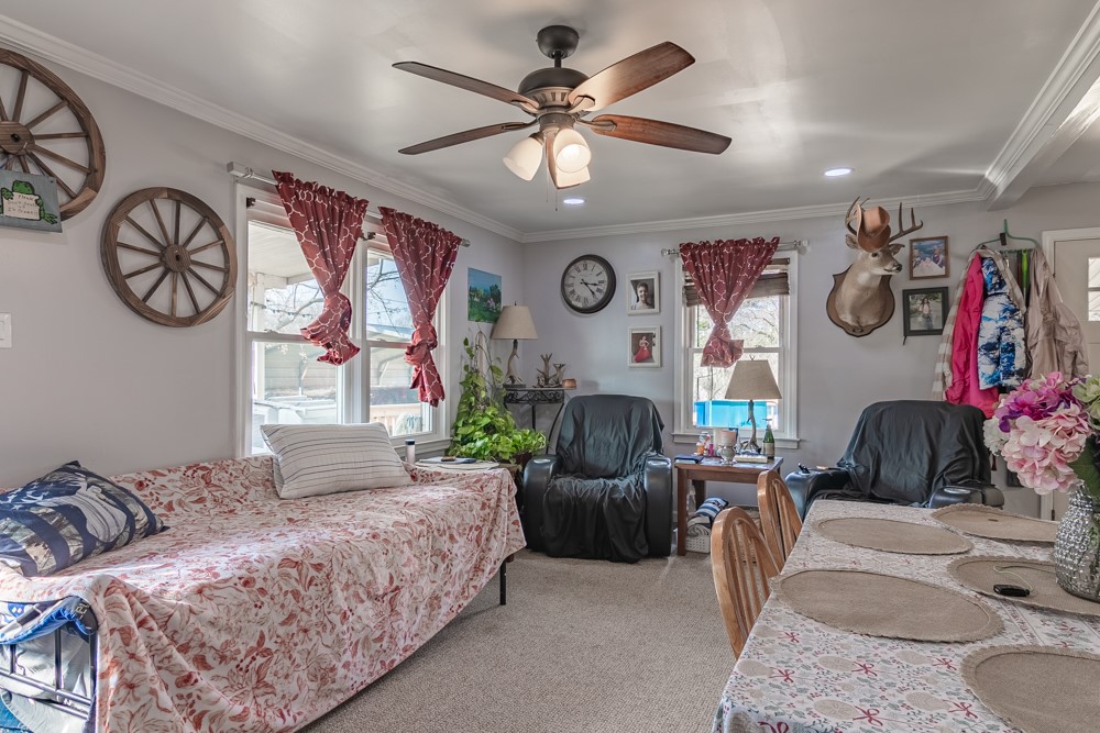 708 Sexton Gin Road Iva, SC 29655 - Photo 8 of 20 This inviting space features comfortable carpeting, recessed lighting, and ample natural light, perfect for everyday living.