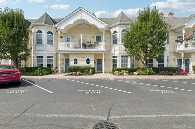 a front view of a building with a street