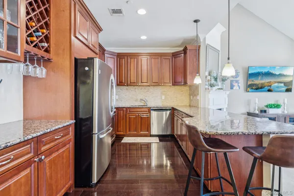 a kitchen with granite countertop lots of counter top space