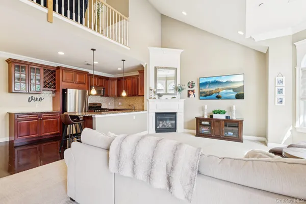 a large white bed in a white room
