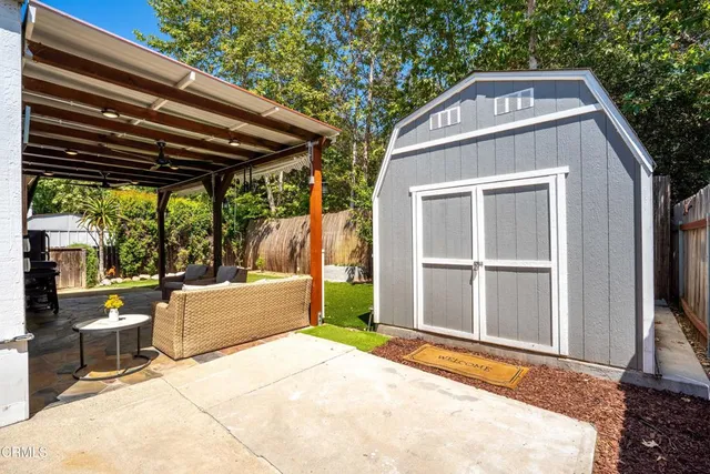 a view of a room with porch and wooden floor