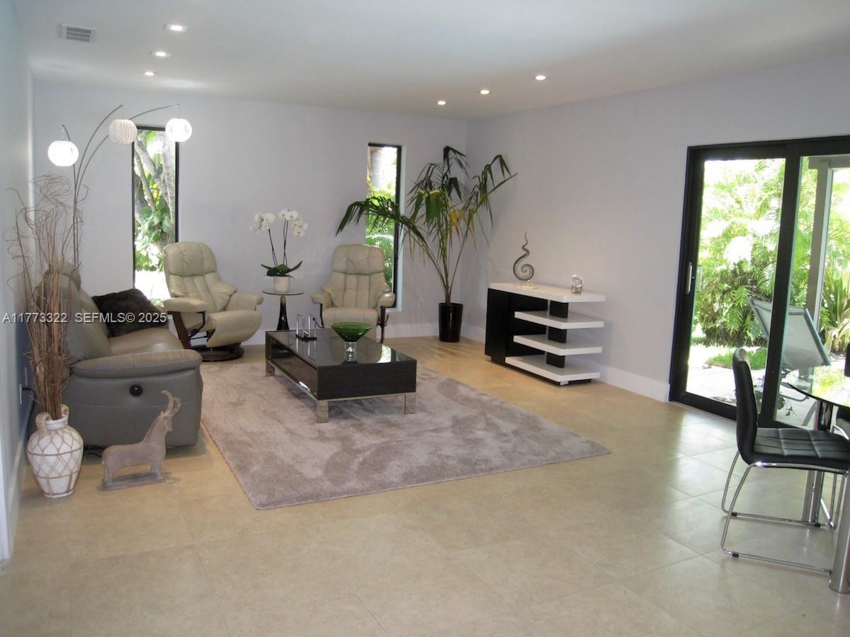 7125 Southwest 120th Street Pinecrest, FL 33156 - Photo 8 of 27 a living room with furniture
