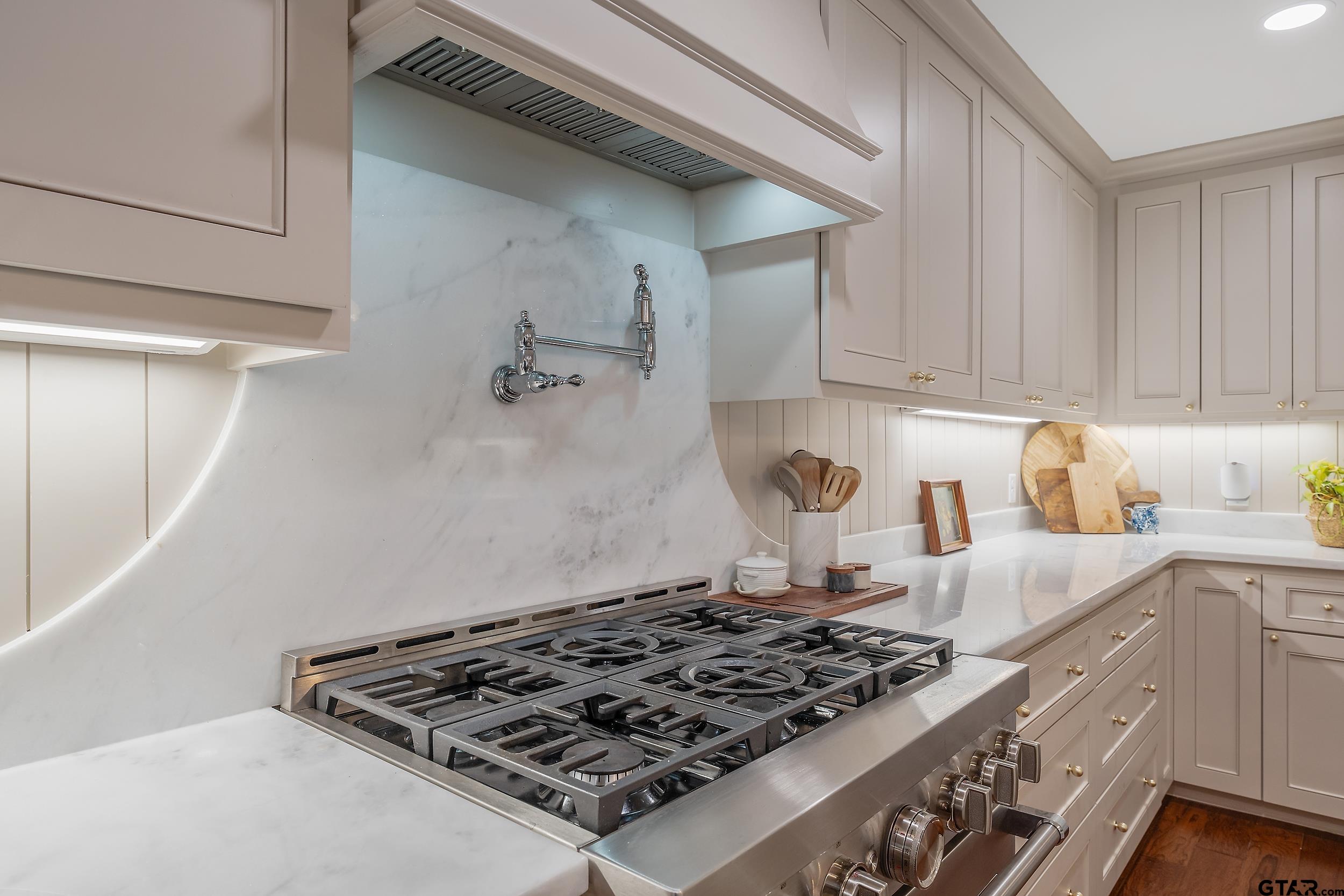 16708 Beddingfield Road Flint, TX 75762 - Photo 13 of 40 a stove top oven sitting inside of a kitchen