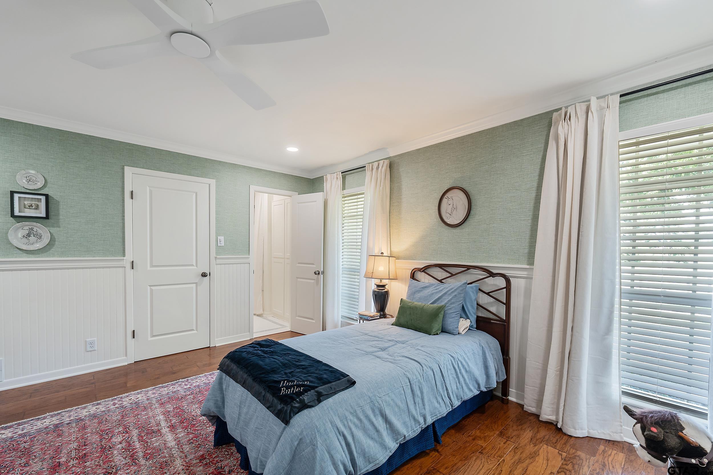 16708 Beddingfield Road Flint, TX 75762 - Photo 36 of 40 a bedroom with a bed and a window