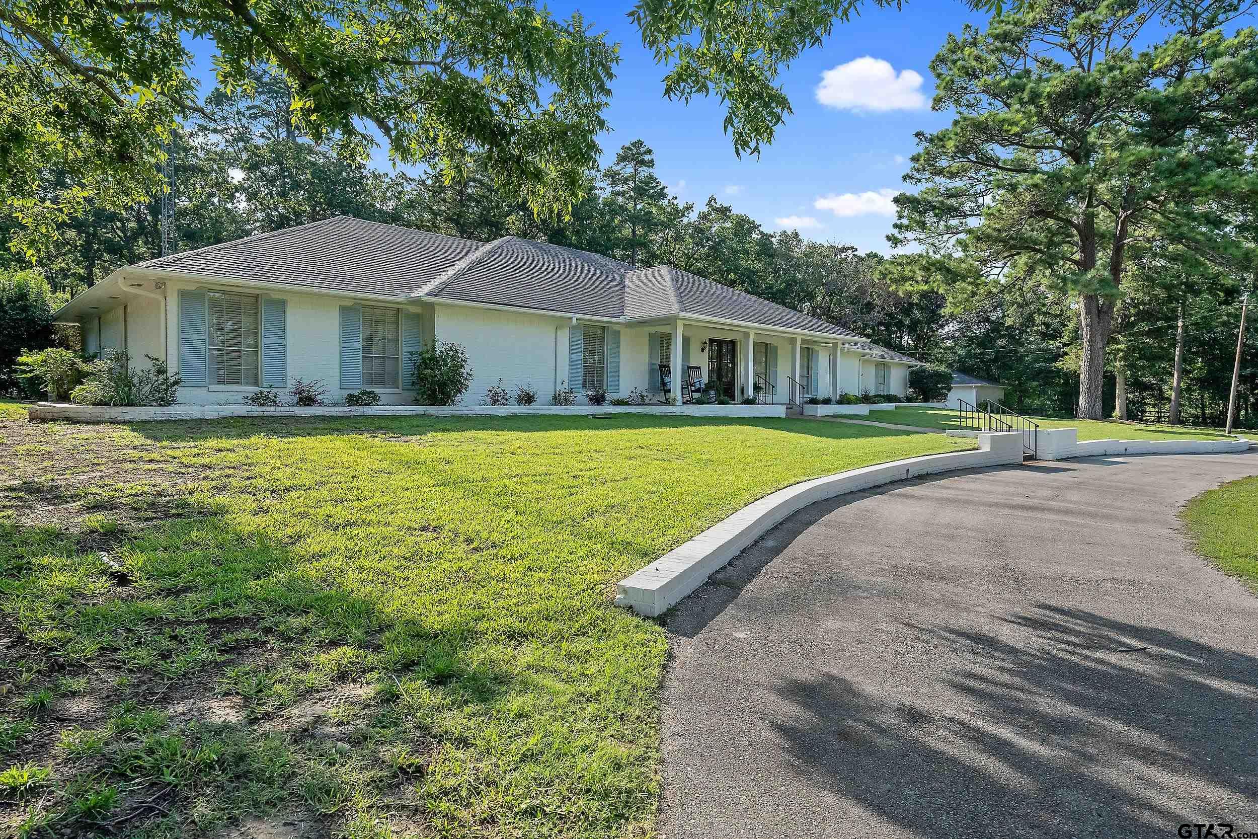 16708 Beddingfield Road Flint, TX 75762 - Photo 4 of 40 a view of a house with a yard
