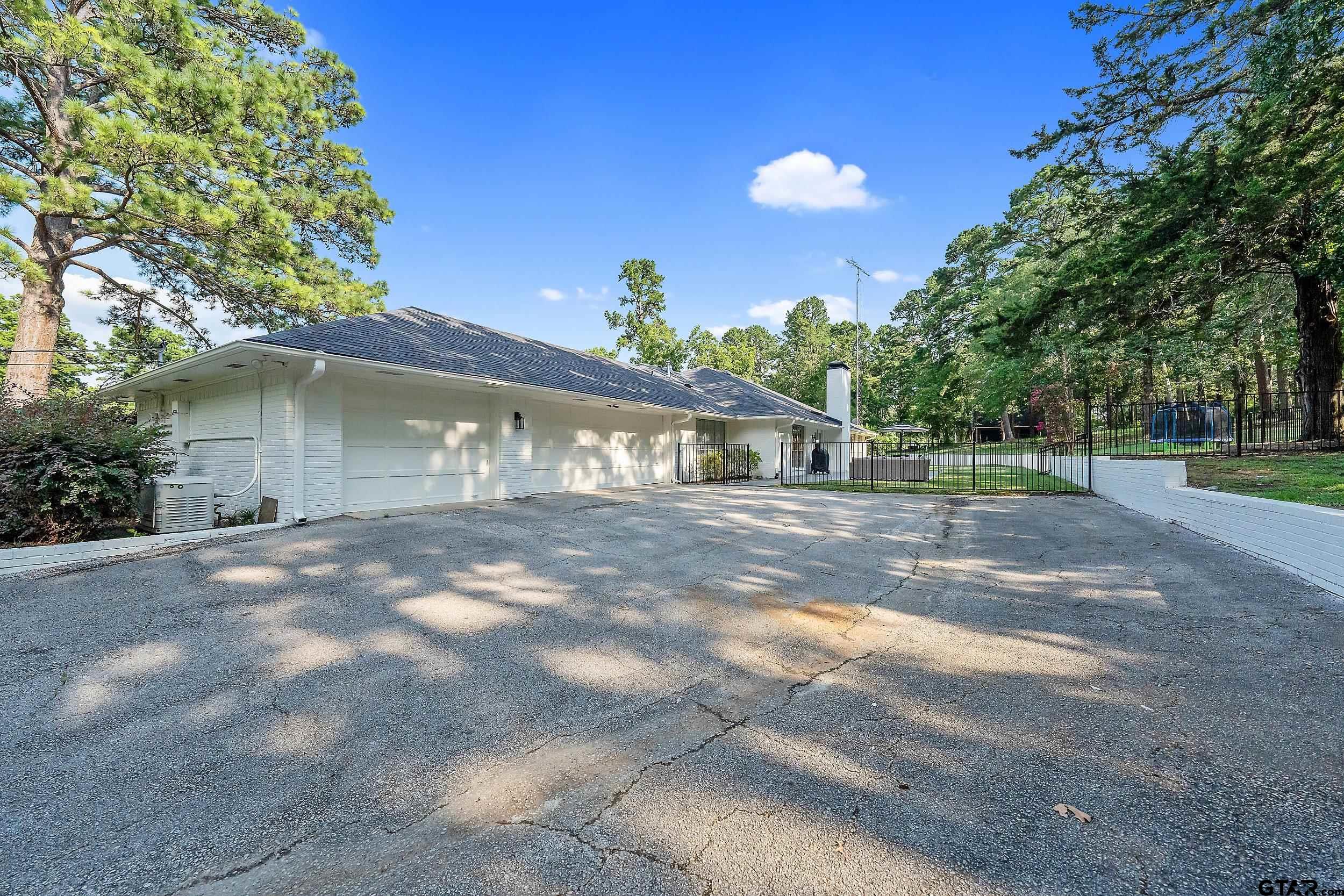 16708 Beddingfield Road Flint, TX 75762 - Photo 5 of 40 a front view of a house with a yard