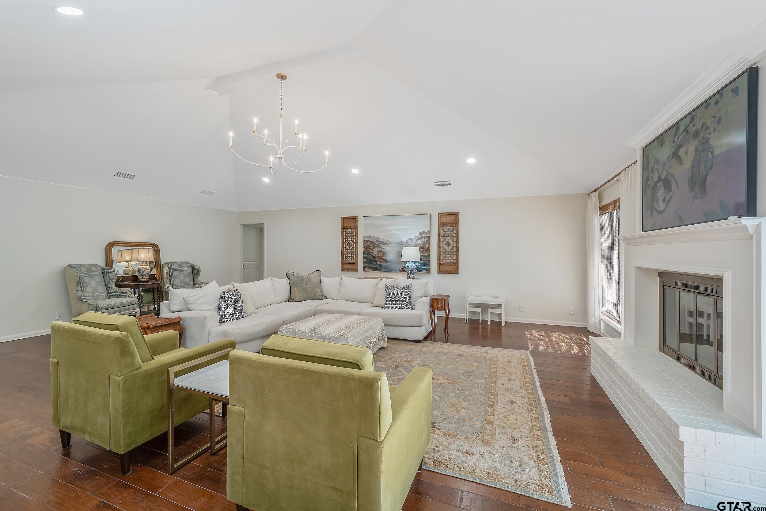 16708 Beddingfield Road Flint, TX 75762 - Photo 9 of 40 a living room with furniture and a fireplace