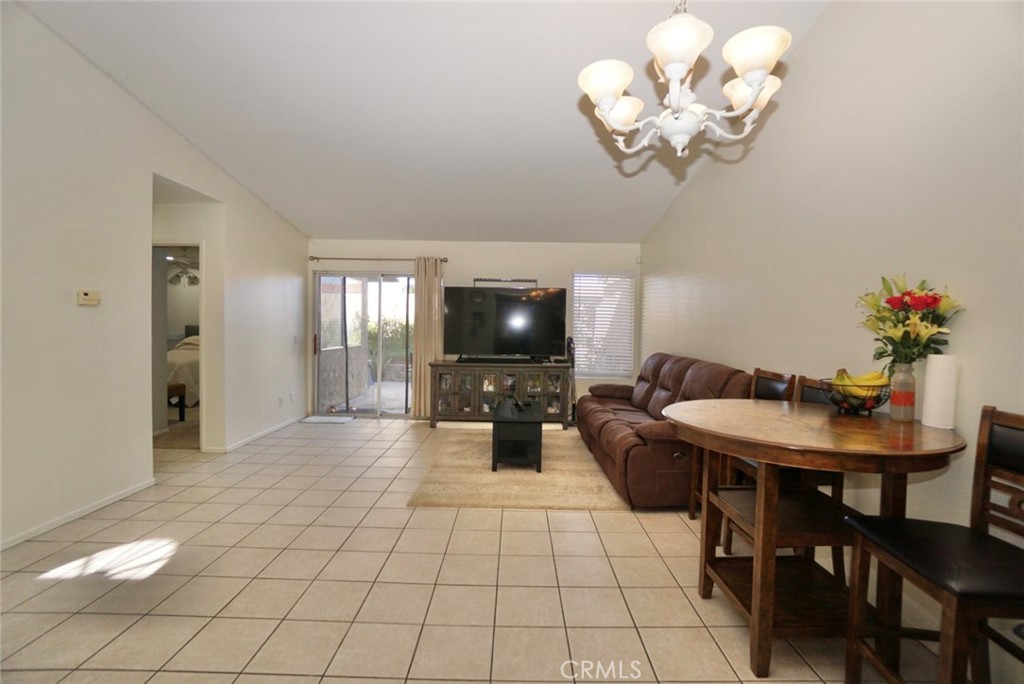 44557 La Paz Road Temecula, CA 92592 - Photo 11 of 24 a view of a dining room with furniture and chandelier