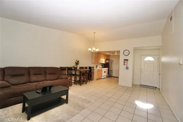 a kitchen with a sink cabinets and stainless steel appliances