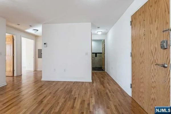 a view of wooden floor in an empty room