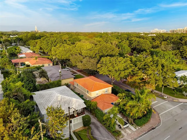 an aerial view of a house with a garden