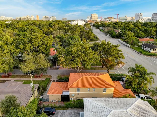 an aerial view of a house with a garden