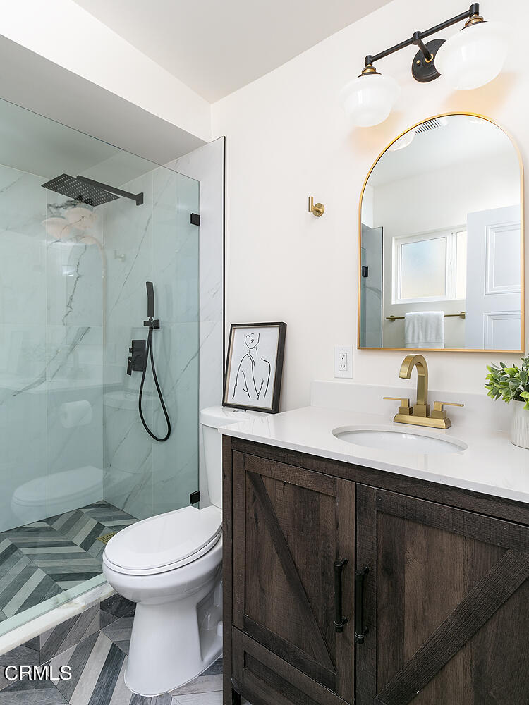 2375 Catherine Road Altadena, CA 91001 - Photo 24 of 50 a bathroom with a sink a toilet and shower