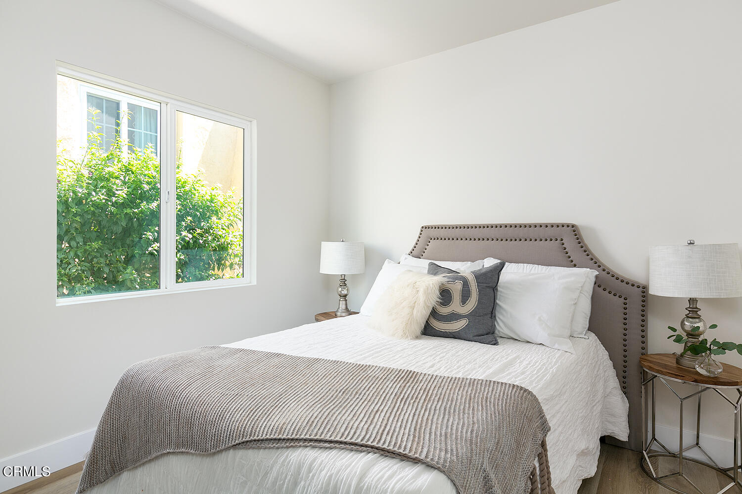 2375 Catherine Road Altadena, CA 91001 - Photo 30 of 50 a bedroom with a bed and a night stand