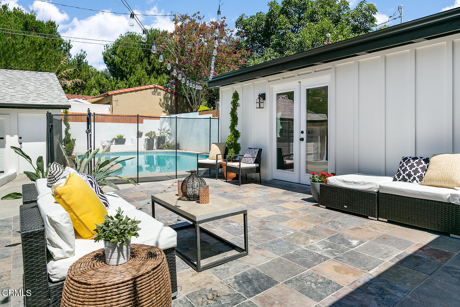 2375 Catherine Road Altadena, CA 91001 - Photo 34 of 50 a view of a patio with couches table and chairs and potted plants