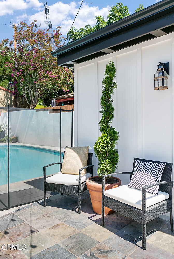 2375 Catherine Road Altadena, CA 91001 - Photo 37 of 50 a patio with table and chairs