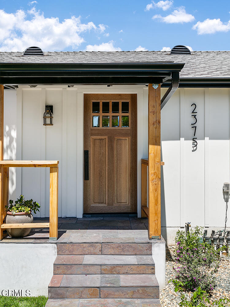 2375 Catherine Road Altadena, CA 91001 - Photo 4 of 50 a front view of a house with a garden